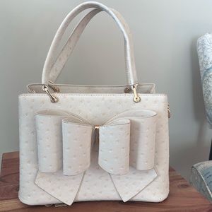 Bow front Purse
